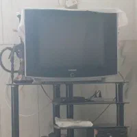 تلویزیون فروشی همراه با میز