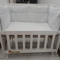 تخت همراه گهواره دار نوزاد