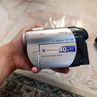 یک دوربین کلکسیونی قدیمی شارژر و کیف|دوربین عکاسی و فیلم‌برداری|اندیشه, اندیشه فاز ۱|دیوار