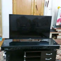 تلوزیون سونی به همراه میز تلویزیون