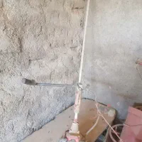 شیر دوش و علف چین علف زن|ماشینآلات صنعتی|حمیدیا, |دیوار