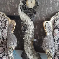 ساعت ایستاده زیبا طلایی طرح طاووس