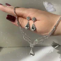 گوشواره آنجلیا خارجی،ساعت نقره‌ای و نیم ست مجلسی