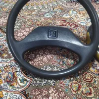 قربیلک و چراغ خطر عقب پژو