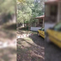 زمین مسکونی به همراه بنا سوئیت در منطقه ای سرسبز