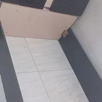 تخت یکنفره با ترکیب رنگ کرم و قهوه ای