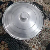 قابلمه  کفگیر و ملاقه  و گاز سه شعله و چرخ خیاطی
