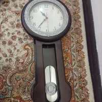 ساعت دیواری قهوه ای تیره