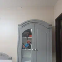 تخت گهواره ای و کمد بچه