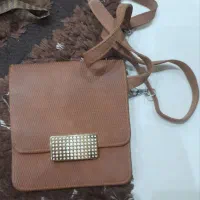 کیف|کیف، کفش، کمربند|اهواز, فرهنگ شهر|دیوار