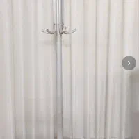 جالباسی ایستاده فلزی با پایه سنگی