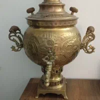 سماور و تعدادی مجسمه برنجی