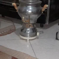 گاز .سماور.میز عسلی بامیه وسط.میز تلوزیون