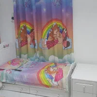 تخت دو منظوره به همراه تشک و روتختی و پرده