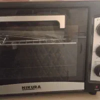 ماکروفر در حد نو و ۳عدد کتاب تست تیزهوشان