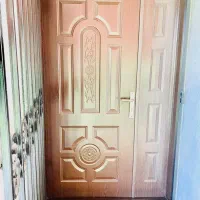 درب چوبی دو لنگه با قفل و دستگیره|فعالیت داوطلبانه|صومعه‌سرا, |دیوار