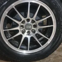 رینگ اسپرت و لاستیک دوتا جلو خارجی دوتا عقب ممولی