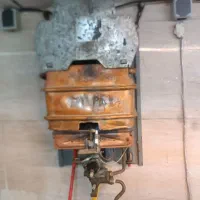 نصاب پکیج آبگرمکن بخاری تعمیرات شوفاژاسیدشویی