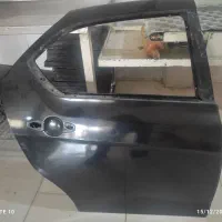 درب عقب خودرو دنا پلاس مشکی مدل 1401