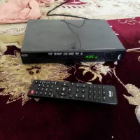یک عدد دی وی دی سالم نو نو با کنترل