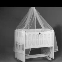 گهواره کنار تخت مادر