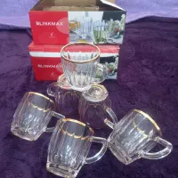 دو دست استکان لب طلا یک دست استکان نلبکی گل قرمز