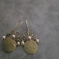 گوشواره بدون فاکتور ۵۰ بالای تابلو