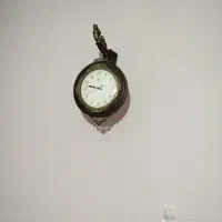 ساعت دیواری دوطرفه