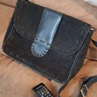 کیف چرم صورمه ای