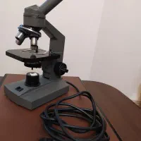 میکروسکوپ تک چشم چهار لنزی