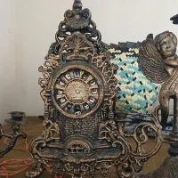 دو عدد جای شمع و ساعت دکوری