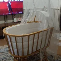 تخت گهواره‌ای نوزاد