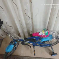 دوچرخه  ۱۶ با کمکی
