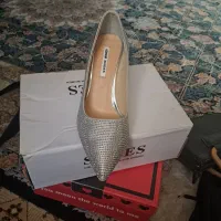 کفش مجلسی|کیف، کفش، کمربند|ری, علایین|دیوار