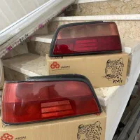 لوازم پژو چراغ باربند فنر لول