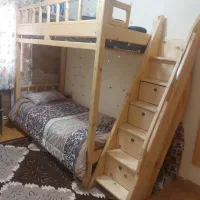 تخت دو طبقه چوبی