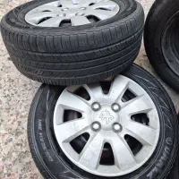 ۴حلقه لاستیک ۱۴ بارز همراه با رینگ و قالپاق.