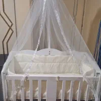 تخت نوزاد  کنار مادر