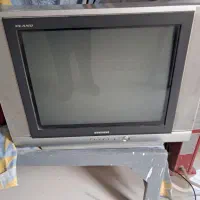 تلویزیون ۲۱ اینچ با میز