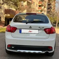 کوییک GXR سفید مشکی 1403 با رینگ