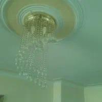 لوستر ۶ شعله کریستال مدل حلزونی