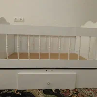 تخت گهواره‌ای کودک