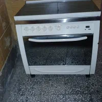 اجاق گاز فردار در حد نو و سینک توکار دو لگن اخوان