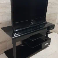 میز زیر تلویزون و تلویزون