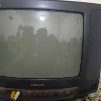تلوزیون۱۴سامسونگ با میز تلوزیون