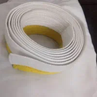 لباس تکواندو با کمر زرد و سفید