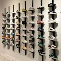 استند بیضی فلزی .دکور فروشگاهی.قفسه کفش.رگال صندل