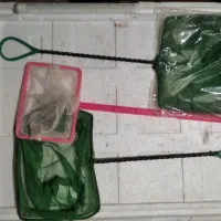 تور ماهی زینتی و شیشه بخاری آکواریوم