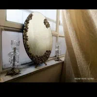آیینه و دو تا شمعدان برنز