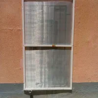 ساخت و نصب توری درب و پنجره پلیسه و آلومینیومی|خدمات پیشه و مهارت|پرند, فاز ۴|دیوار